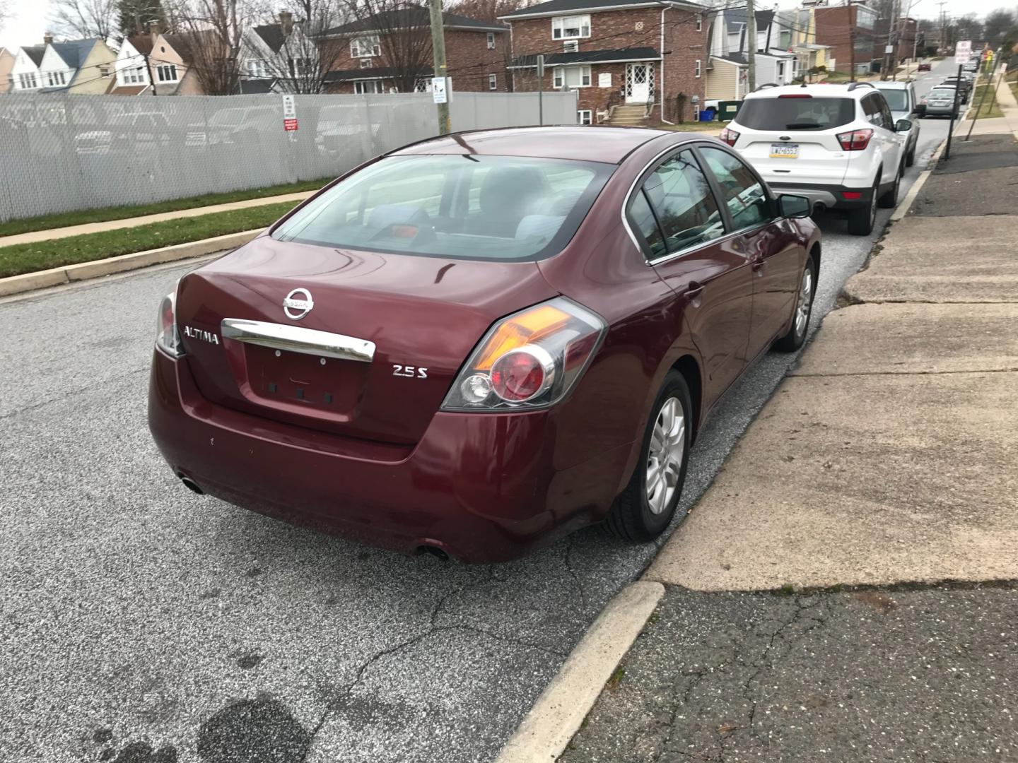 2010 Maroon /Gray Nissan Altima 2.5 (1N4AL2APXAN) , Automatic transmission, located at 577 Chester Pike, Prospect Park, PA, 19076, (610) 237-1015, 39.886154, -75.302338 - Photo#4